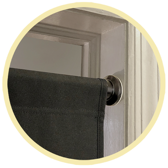 The PortaGlory glory hole easily adjusts to fit any doorway using heavy-duty tension rods.